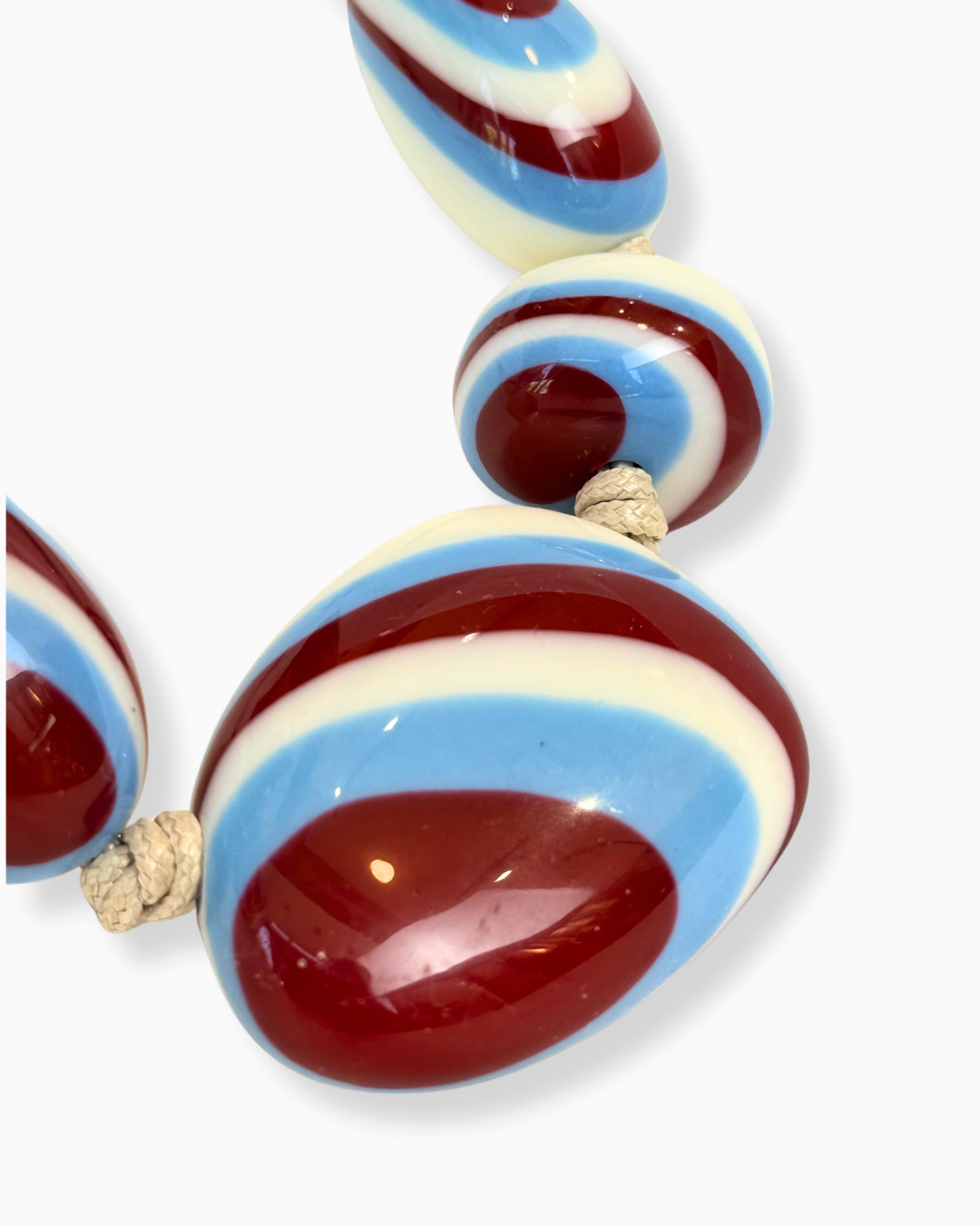 COLLAR RESINA PLUMEIRA BURDEO/CELESTE