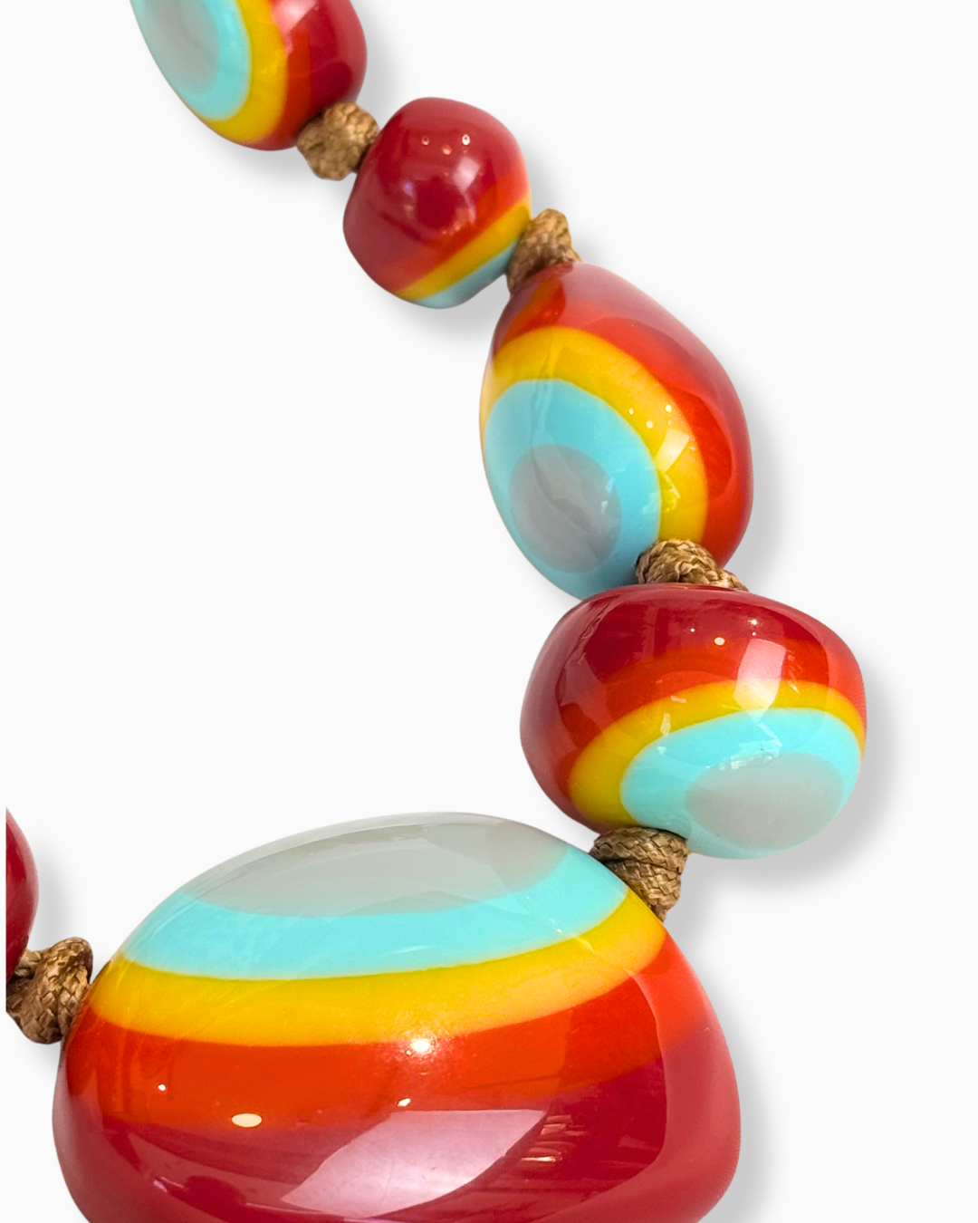 COLLAR RESINA PLUMEIRA CELESTE/GRIS