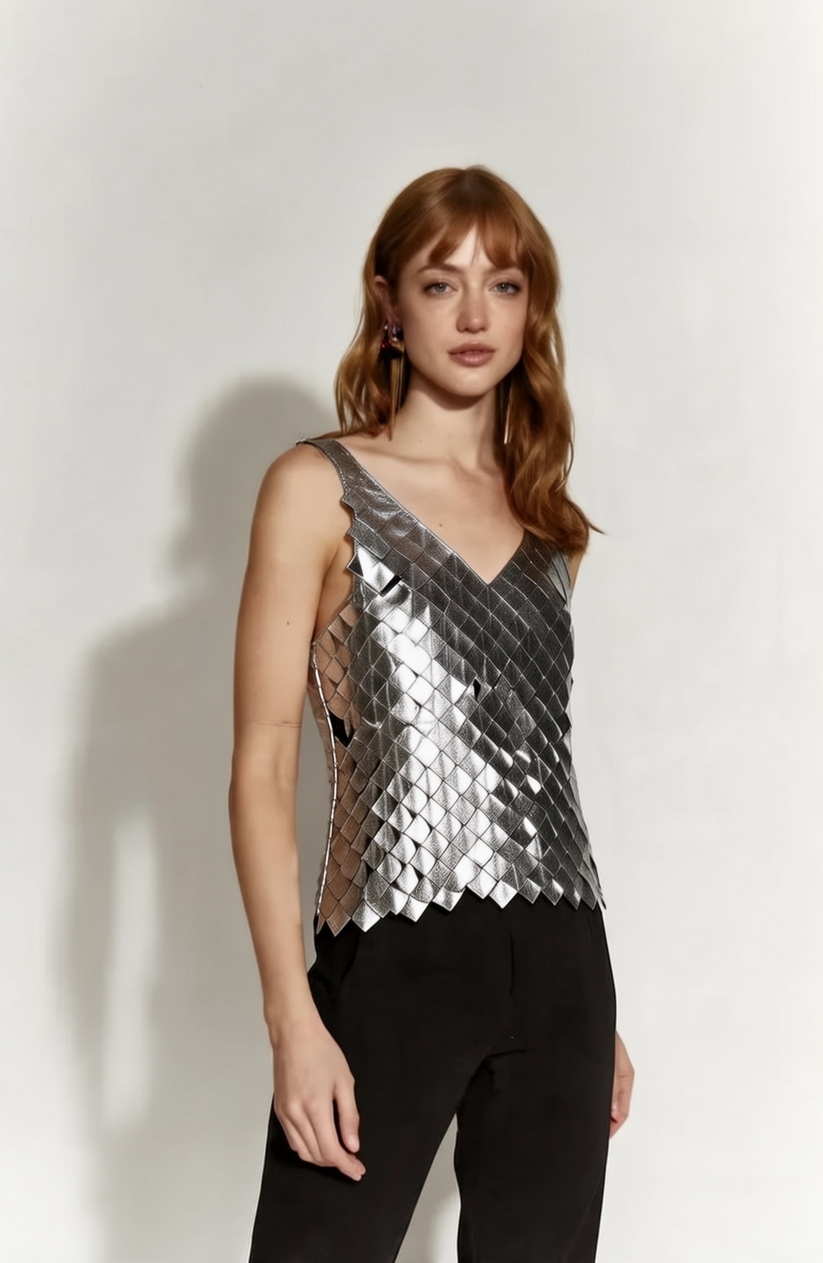 POLERA CUERO CUADROS PLATA
